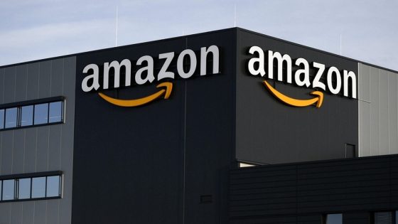 This picture shows the logo of US online retail giant Amazon at the distribution center in Moenchengladbach, western Germany, on December 17, 2019. (Photo by INA FASSBENDER / AFP)